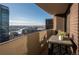 Urban view from balcony; outdoor furniture makes for a great place to enjoy the scenery at 1020 15Th St # 32K, Denver, CO 80202