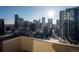 Breathtaking city skyline views from this high-rise condo, showcasing the vibrant urban landscape at 1020 15Th St # 32K, Denver, CO 80202