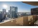 An amazing city view from a great balcony on a sunny day with clear skies at 1020 15Th St # 32K, Denver, CO 80202