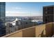 Fantastic city views from a balcony with clear skies and distant mountains at 1020 15Th St # 32K, Denver, CO 80202