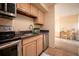 Well-equipped kitchen with stainless steel appliances and easy access to the adjacent room at 1020 15Th St # 32K, Denver, CO 80202