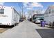 Street view of a residence and garage, with a camper parked on the side at 4445 Pearl St, Denver, CO 80216