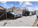 A spacious detached two-car garage, surrounded by a fenced yard at 4445 Pearl St, Denver, CO 80216