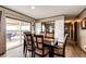 Contemporary dining room with access to outdoor deck with great views and ample seating at 6201 S Vanderhoof St, Bennett, CO 80102