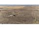 Expansive aerial view showing the vast land surrounding a rural property at 6201 S Vanderhoof St, Bennett, CO 80102