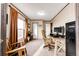 Home office with natural light, comfortable seating, and a spacious desk at 6201 S Vanderhoof St, Bennett, CO 80102