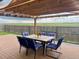 Outdoor patio with a pergola and outdoor dining set with a view at 6201 S Vanderhoof St, Bennett, CO 80102