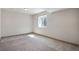 Finished basement featuring neutral walls, carpet, and one window at 24593 E 34Th Ave, Aurora, CO 80019