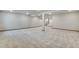 Expansive finished basement featuring neutral carpet, recessed lights, and staircase at 24593 E 34Th Ave, Aurora, CO 80019
