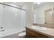 Full bathroom featuring tiled shower, bath, and single sink vanity at 24593 E 34Th Ave, Aurora, CO 80019