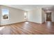 Bright living room with laminate wood flooring and natural light at 24593 E 34Th Ave, Aurora, CO 80019