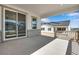 Covered back patio with concrete floors and views of the neighborhood at 24593 E 34Th Ave, Aurora, CO 80019
