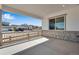 Covered back patio with concrete floors and views of the neighborhood at 24593 E 34Th Ave, Aurora, CO 80019