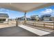 Covered back patio with concrete floors and views of the neighborhood at 24593 E 34Th Ave, Aurora, CO 80019