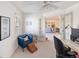 Home office with French doors opening to living room at 23694 Pondview Pl # B, Golden, CO 80401