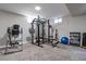 Finished basement featuring a workout station with weight rack and free weights at 270 S Chase St, Lakewood, CO 80226