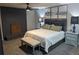 Bedroom featuring a fireplace, queen bed, and blue-themed decorations at 270 S Chase St, Lakewood, CO 80226
