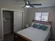 Bedroom featuring a comfortable bed, closet, and a window offering natural light at 270 S Chase St, Lakewood, CO 80226