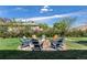 Inviting backyard fire pit area with comfortable seating, perfect for outdoor gatherings and relaxation at 270 S Chase St, Lakewood, CO 80226