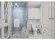 Bright bathroom with glass shower at 29 Viking Dr, Cherry Hills Village, CO 80113