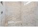 Tiled shower with built-in bench at 29 Viking Dr, Cherry Hills Village, CO 80113