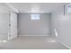 Spacious basement room with a window and carpet at 2408 E Cresthill Ave, Centennial, CO 80121