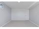 Finished basement with a plank wall, carpeted floor and neutral paint at 2408 E Cresthill Ave, Centennial, CO 80121