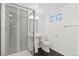 Modern bathroom with a glass shower, sink, and tile floors at 2408 E Cresthill Ave, Centennial, CO 80121