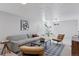 Stylish living room with a comfortable sofa and a sleek coffee table at 2408 E Cresthill Ave, Centennial, CO 80121