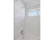 Modern shower with a tile surround, a window and a shower head with great water pressure at 2408 E Cresthill Ave, Centennial, CO 80121
