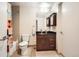 Well-lit bathroom showcases a sleek vanity, modern fixtures, and a shower-tub combination for everyday convenience at 891 14Th St # 2205, Denver, CO 80202