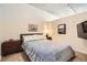 Cozy bedroom featuring plush carpeting, a comfortable bed, and modern decor elements for a peaceful retreat at 891 14Th St # 2205, Denver, CO 80202