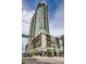 Modern condo building featuring sleek architecture, balconies, and city views at 891 14Th St # 2205, Denver, CO 80202