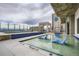 Inviting rooftop pool with relaxing lounge chairs and beautiful city views, perfect for unwinding in style at 891 14Th St # 2205, Denver, CO 80202