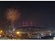 Scenic night view of stadium and cityscape with fireworks in the background at 891 14Th St # 2205, Denver, CO 80202