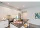 Modern kitchen with island, stainless appliances and lots of counter space at 1300 N Ogden St # 204, Denver, CO 80218