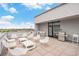 Rooftop deck with grill and multiple seating options, perfect for entertaining at 1300 N Ogden St # 204, Denver, CO 80218