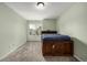 Charming bedroom featuring a unique wood frame bed and a window view at 8918 W 101St Ave, Broomfield, CO 80021
