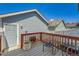 Outdoor deck with seating area, perfect for relaxing and enjoying the weather at 18947 E 57Th Pl, Denver, CO 80249