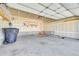 Spacious two car garage offering ample storage space for tools and equipment at 18947 E 57Th Pl, Denver, CO 80249
