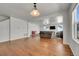 Spacious living room featuring hardwood floors and open floor plan at 18947 E 57Th Pl, Denver, CO 80249