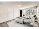 Bright home office featuring a sleek desk, a comfortable chair, and ample storage space at 12143 Melody Dr # 104, Denver, CO 80234