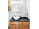 Bathroom with a vessel sink and dark countertop at 7700 E 29Th Ave # 411, Denver, CO 80238