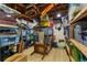 Spacious storage basement with rows of shelving and organization bins at 1410 S Ammons St, Lakewood, CO 80232