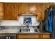 Stainless steel sink and faucet with ample counter space at 1410 S Ammons St, Lakewood, CO 80232