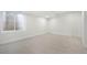 Neutral bedroom featuring carpet, neutral paint, and a window at 3047 S Cherokee St, Englewood, CO 80110