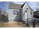 Charming cottage home featuring a well-maintained front yard, neutral paint and a peaked roof line at 118 S Dale Ct, Denver, CO 80219