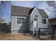 Charming home featuring updated paint, a newer roof, a gated entry, and great curb appeal at 118 S Dale Ct, Denver, CO 80219