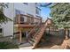 Backyard features an upper level deck and access to the backyard at 10572 Jaguar Gln, Lone Tree, CO 80124