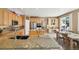 Spacious kitchen featuring stainless steel appliances, granite counters, and eat-in dining at 10572 Jaguar Gln, Lone Tree, CO 80124
